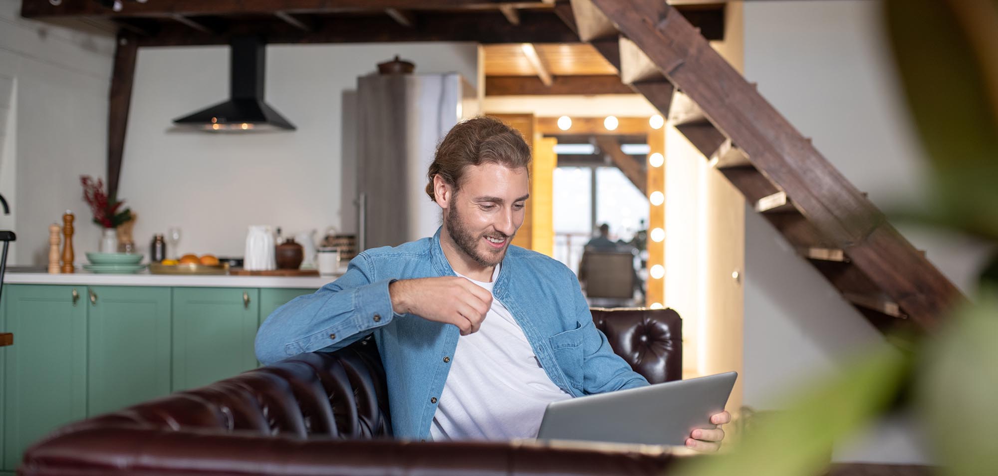man on laptop at home