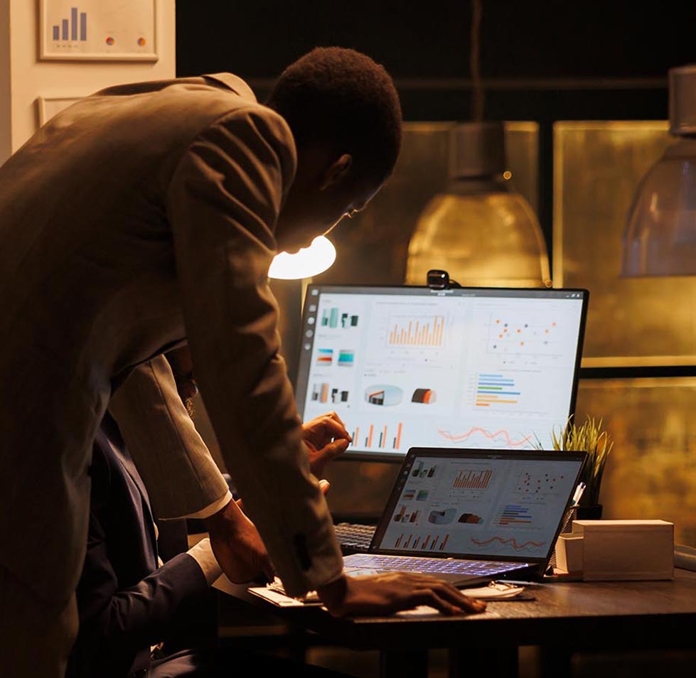 executive managers analysing data