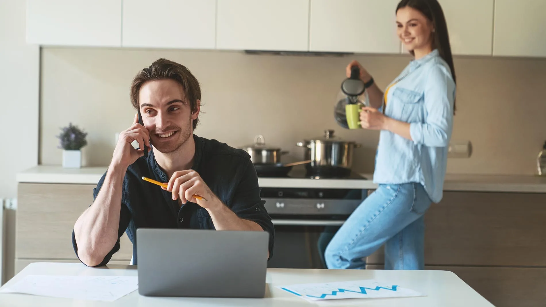 Man working on a laptop at home